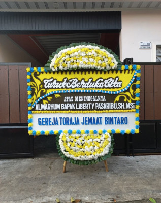 Papan Bunga Duka di Tangga Jaya